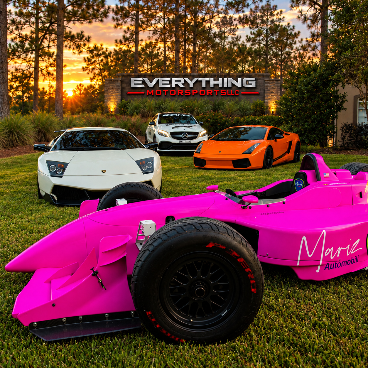 EverythingMotorsports LLC collection at sunset in front of the dealership sign